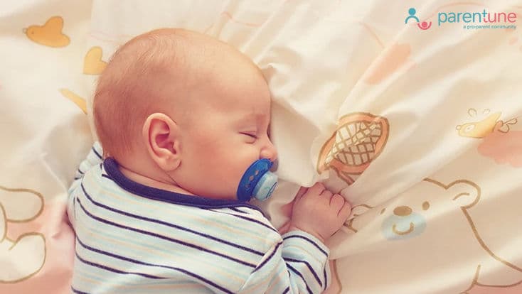 How can I train my baby to sleep well through the night?